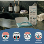 An ULTRA-GUIDE floss box open on a bathroom counter, for implants, bridges, braces and bonded retainers