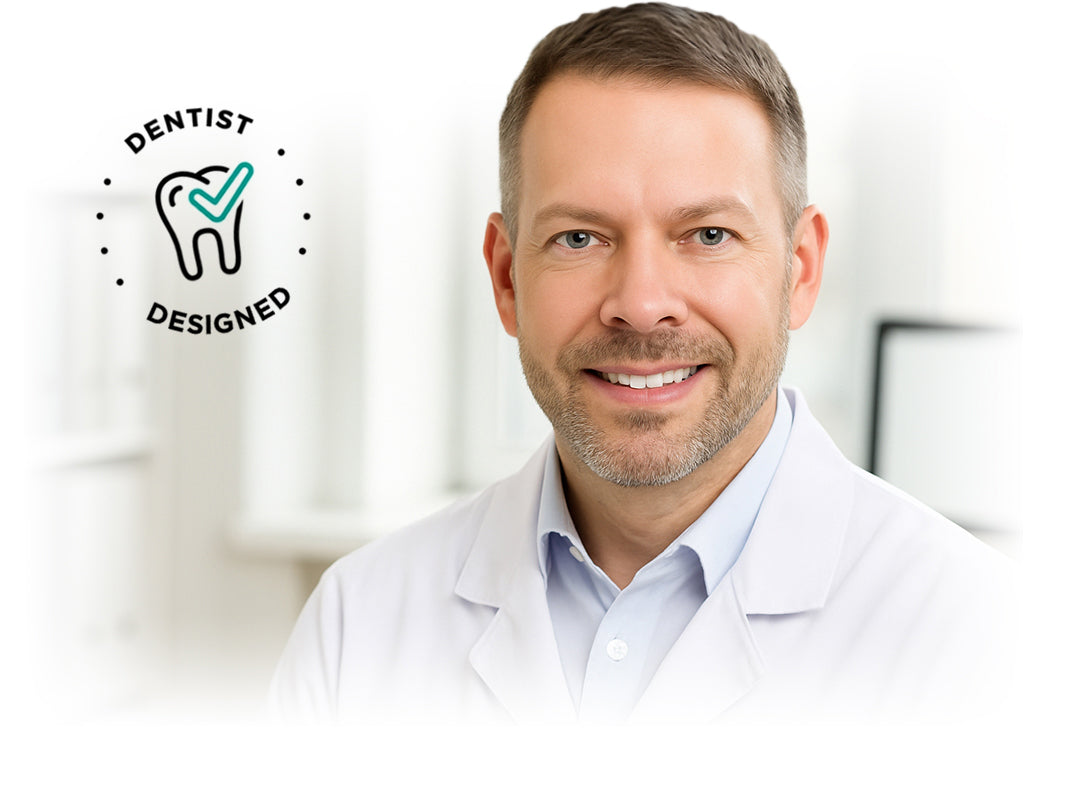 Dr. Thomas Jackson in scrubs in a dental treatment room, The AutoFlosser on the screen behind him